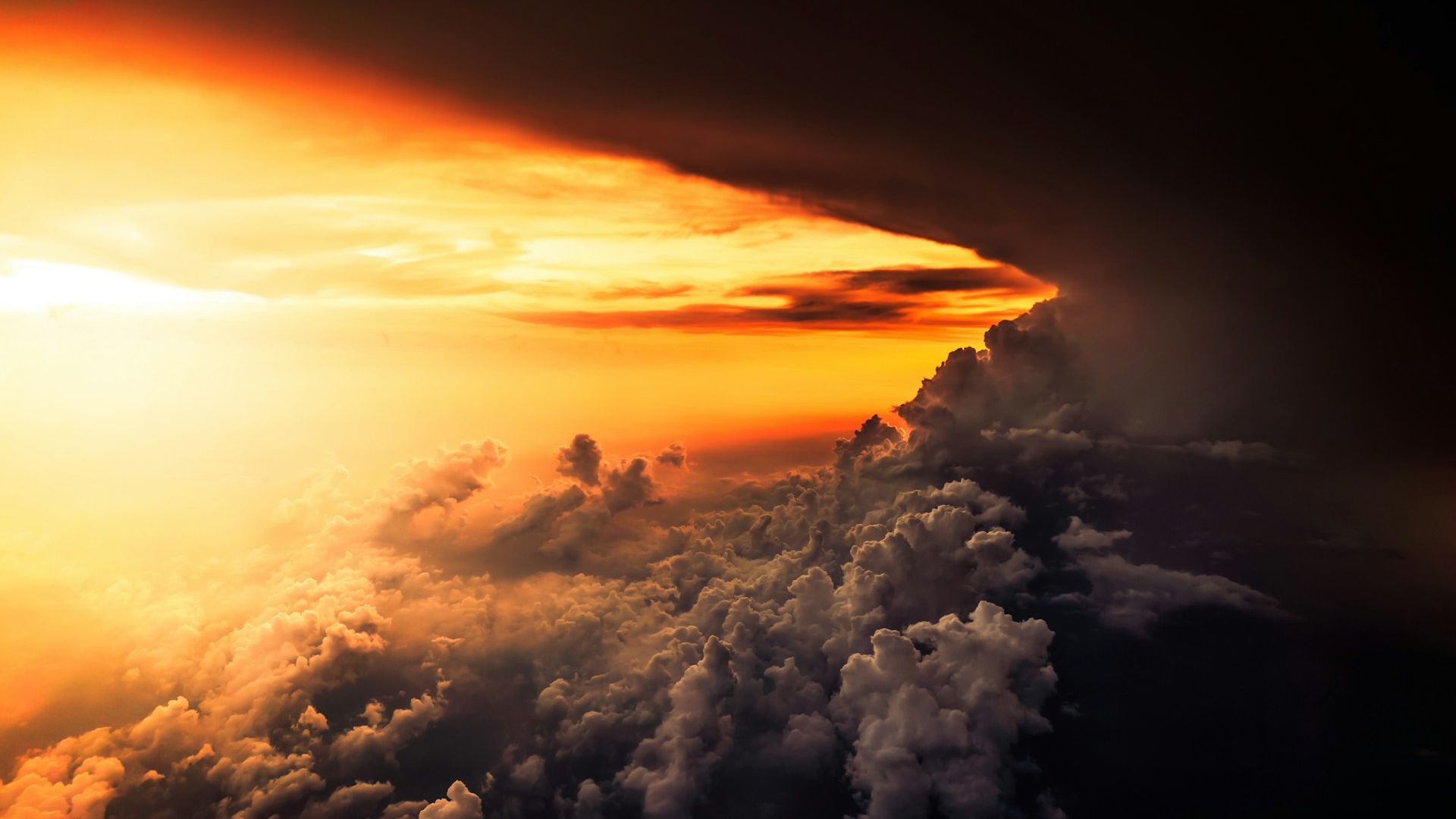 Sunlight over a cloud-filled sky